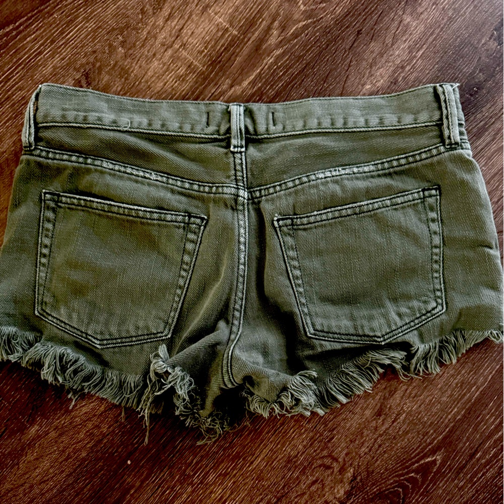 Free People We The Free 25 Mid-Rise Distressed Cotton Denim Shorts Green